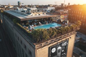 Group enjoying rooftop pool on a Private Event Space in St. Louis.