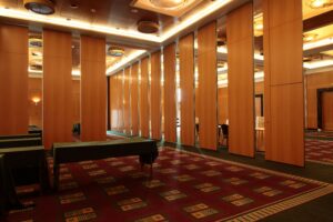 Elegant event space St Louis with modern table and chair setup in a bright ballroom.