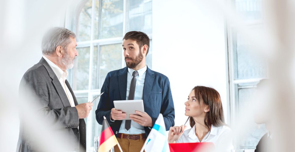 The business people working together at table. The meeting or summit concept