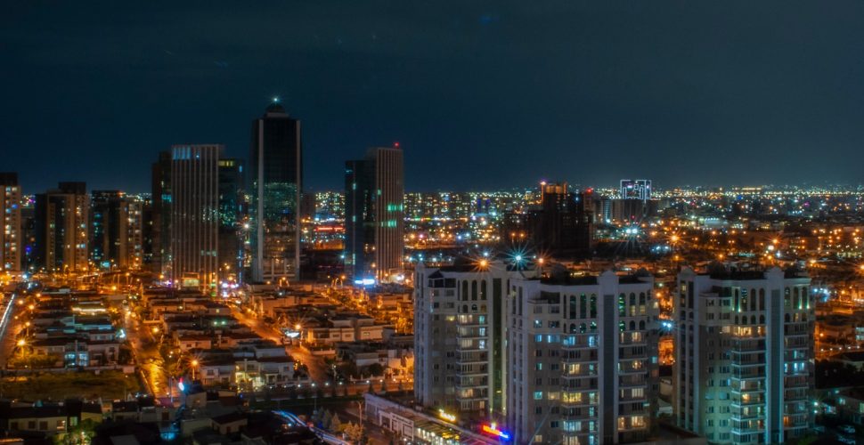 Rooftop event space in St. Louis with panoramic city views at night, offering a stunning skyline backdrop for parties, weddings, and corporate events.