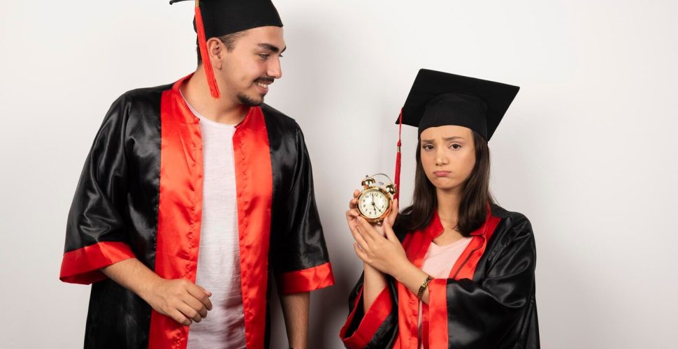 pair-students-gown-with-clock-standing-white_114579-53803